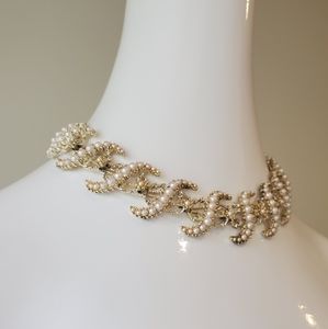 Gold and Pearl Accent Necklace
